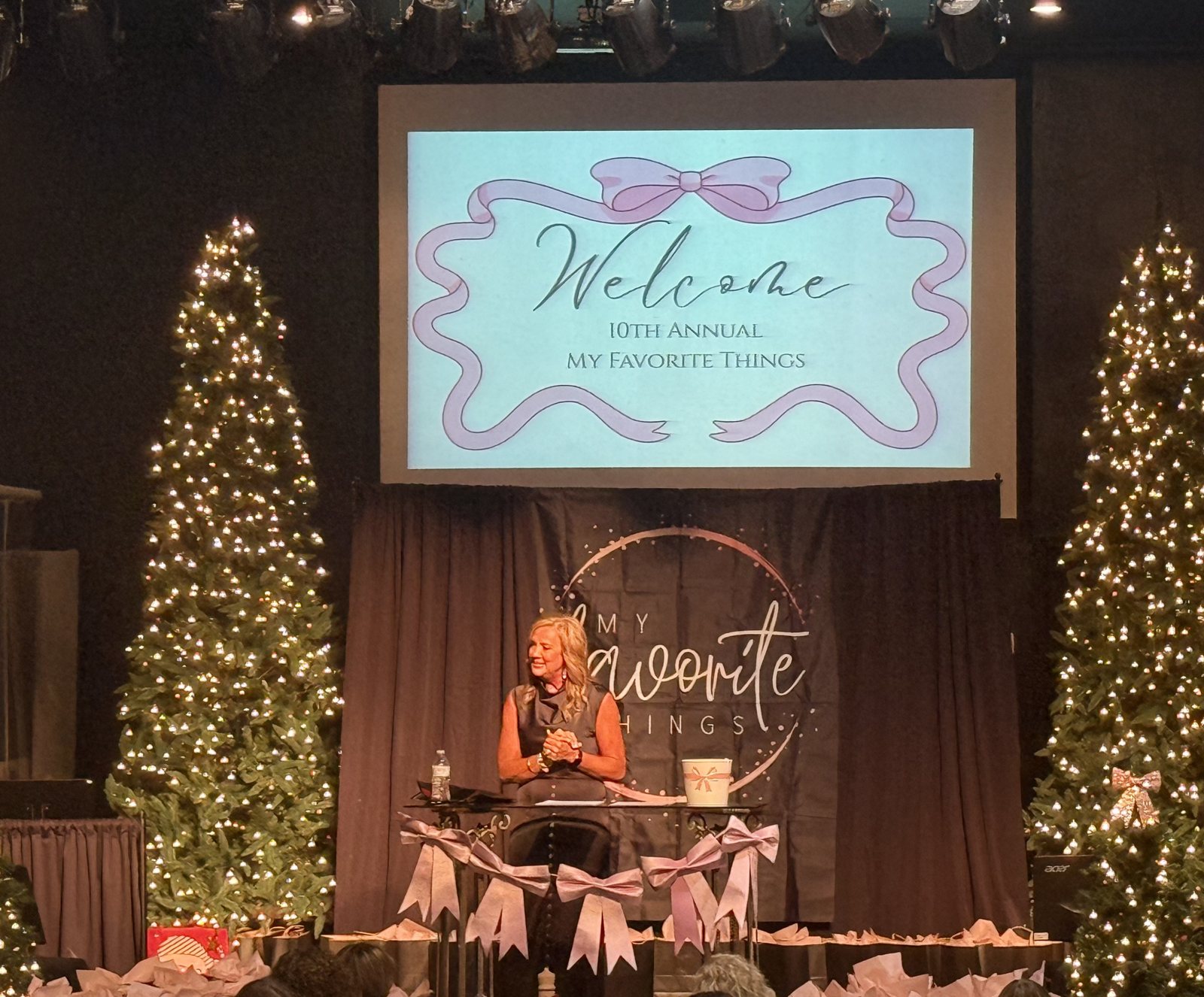 Danielle welcoming guests to the 10th annual My Favorite Things