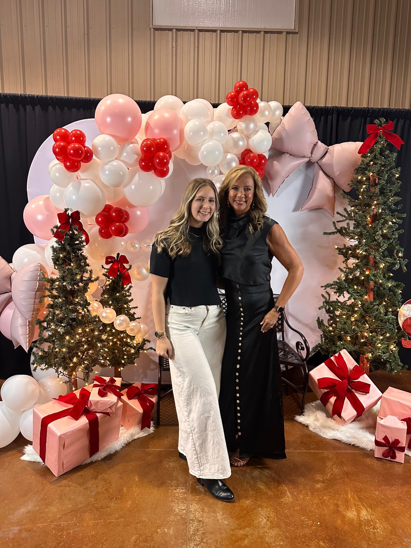 Danielle and Sadie at the My Favorite Things photo backdrop